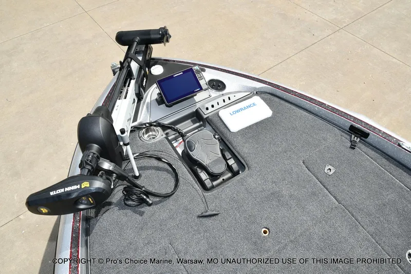 Slide: The Image of 2024 Triton 18 TRX boat deck with Minn Kota trolling motor and Lowrance electronics. - 45