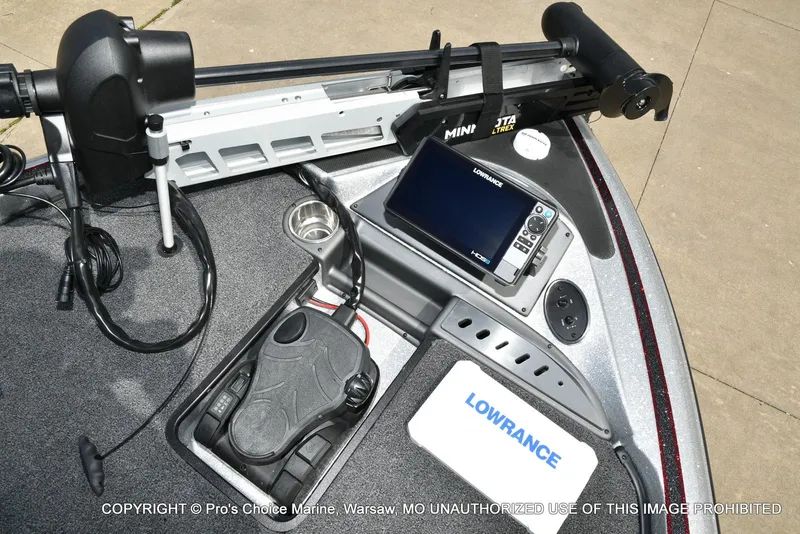 Slide: The Image of 2024 Triton 18 TRX boat deck with Lowrance fishfinder and Minn Kota trolling motor. - 46