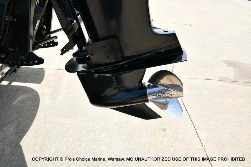 Slide: The Image of 2018 Nitro Z19 Pro Pack boat motor with Fury propeller on concrete surface. - 25