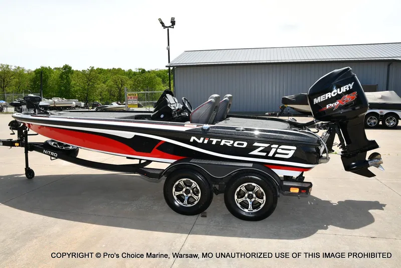 Slide: The Image of 2018 Nitro Z19 Pro Pack boat with Mercury Pro XS engine on trailer. - 28