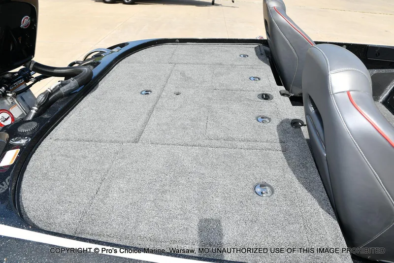 Slide: The Image of 2018 Nitro Z19 Pro Pack boat interior with gray carpet and seating. - 41