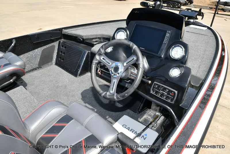 Slide: The Image of 2018 Nitro Z19 Pro Pack boat interior with steering wheel and Garmin display. - 42