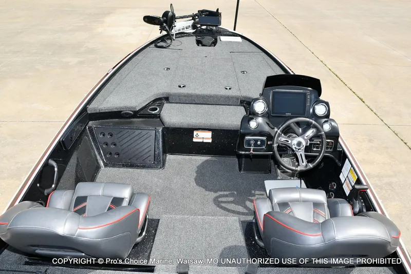 Slide: The Image of 2018 Nitro Z19 Pro Pack boat interior with steering console and seating. - 44