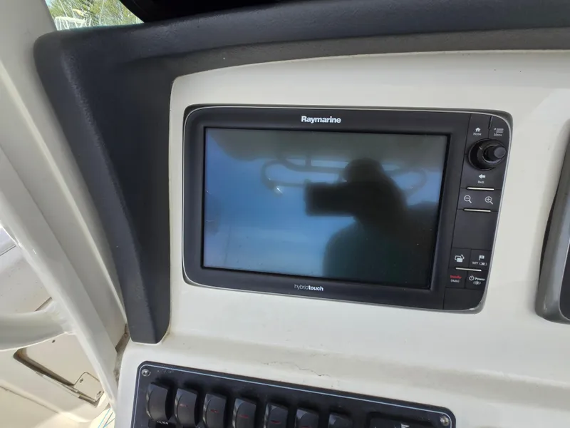 Slide: The Image of Raymarine display on 2013 Boston Whaler 280 Outrage boat dashboard. - 17