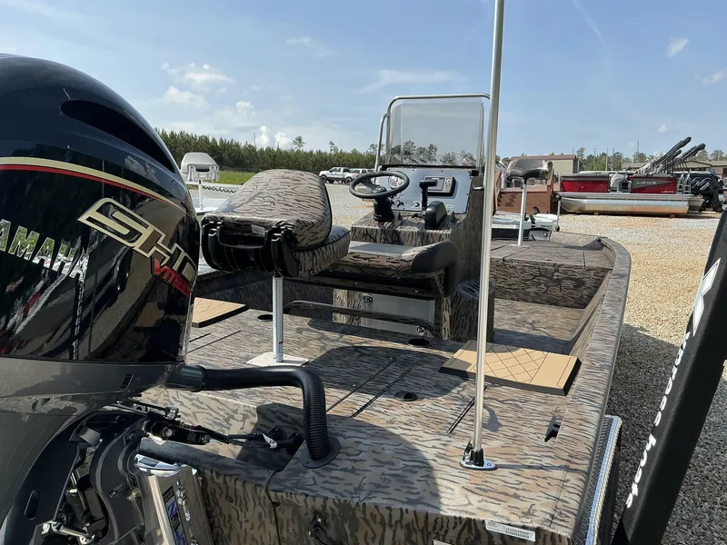 Slide: The Image of 2025 Xpress Hyper-Lift Bay Series 210 BAY-175 HP boat with Yamaha engine, camo design. - 5