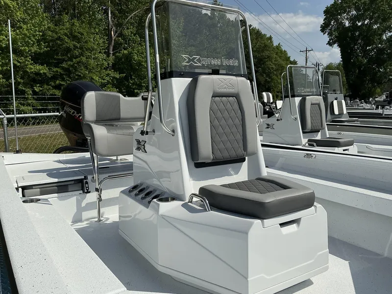 Slide: The Image of 2025 Xpress Hyper-Lift Series H22B boat with sleek seating and modern design. - 6