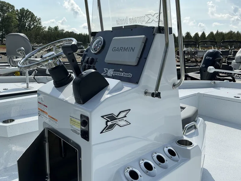 Slide: The Image of 2025 Xpress Hyper-Lift Series H22B boat console with Garmin navigation system. - 9