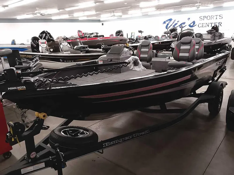 The Image of 2025 Ranger VS1782SC Angler boat displayed indoors at a sports center. - 0
