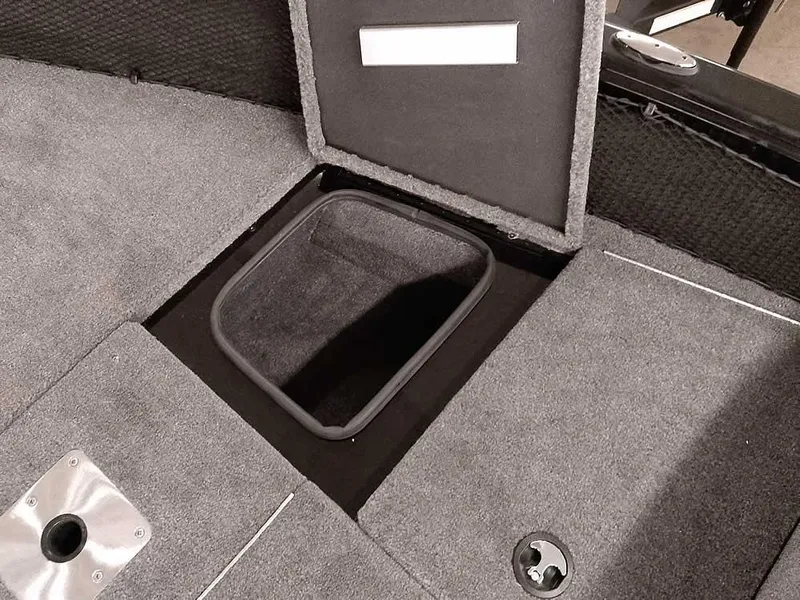 Slide: The Image of 2025 Ranger VS1782SC Angler boat storage compartment with open hatch. - 10