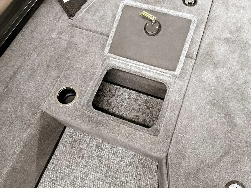 Slide: The Image of 2025 Ranger VS1782SC Angler boat interior with storage compartment and cup holder. - 13