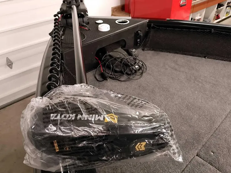 Slide: The Image of 2025 Ranger VS1782SC Angler boat with Minn Kota trolling motor in garage. - 15