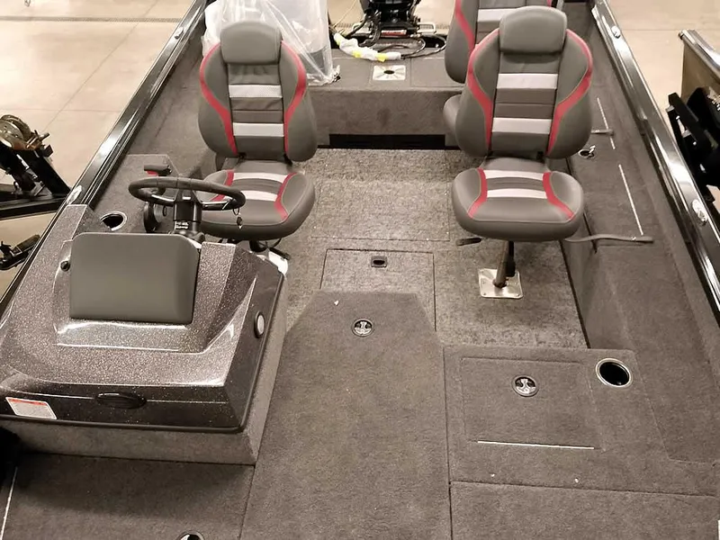 Slide: The Image of 2025 Ranger VS1782SC Angler boat interior with three seats and steering console. - 16