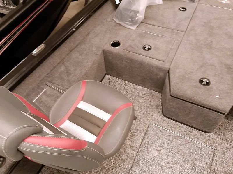 Slide: The Image of 2025 Ranger VS1782SC Angler boat interior with gray and red seating and storage compartments. - 17