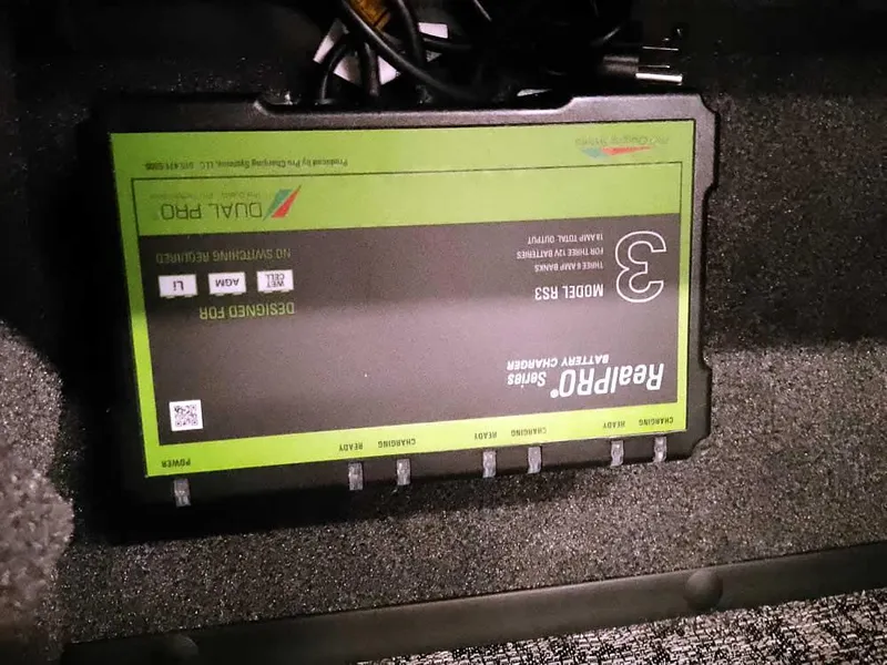 Slide: The Image of Ranger VS1782SC Angler 2025 with Rapro Series Battery Charger, Model RS3, in storage compartment. - 19