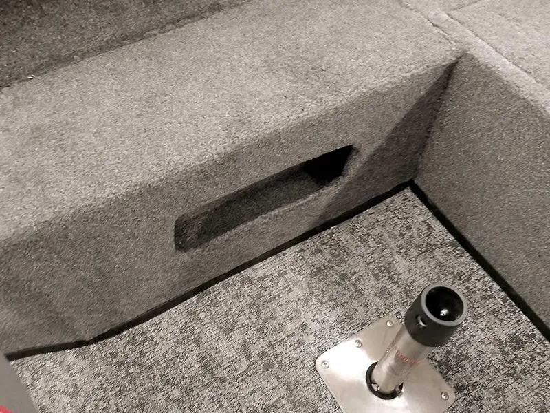 Slide: The Image of 2025 Ranger VS1782SC Angler boat interior with carpeted storage compartment and seat base. - 23