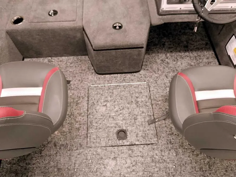 Slide: The Image of 2025 Ranger VS1782SC Angler boat interior with two seats and carpeted flooring. - 5