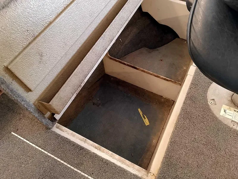 Slide: The Image of Storage compartment in 2006 Crestliner 1850 Fish Hawk DC boat interior. - 20