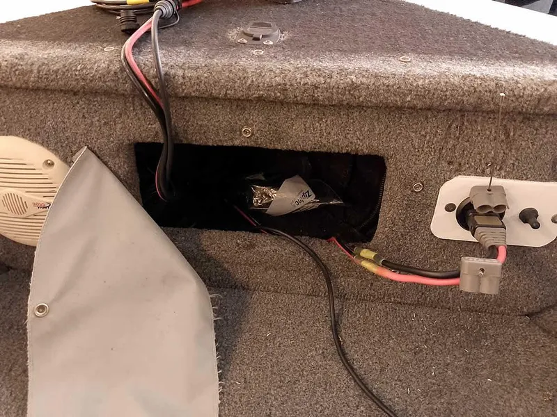 Slide: The Image of Interior wiring of a 2006 Crestliner 1850 Fish Hawk DC boat, showing cables and connectors. - 22