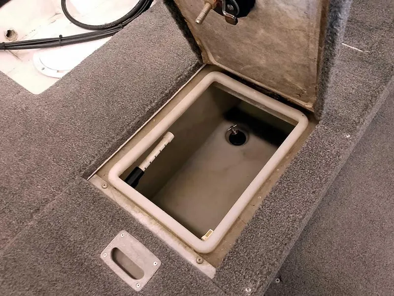 Slide: The Image of Open storage compartment in 2006 Crestliner 1850 Fish Hawk DC boat. - 33