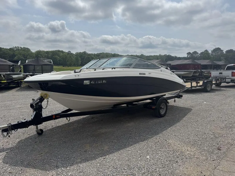 Slide: The Image of 2013 Yamaha Boats SX190 on trailer in outdoor setting. - 1