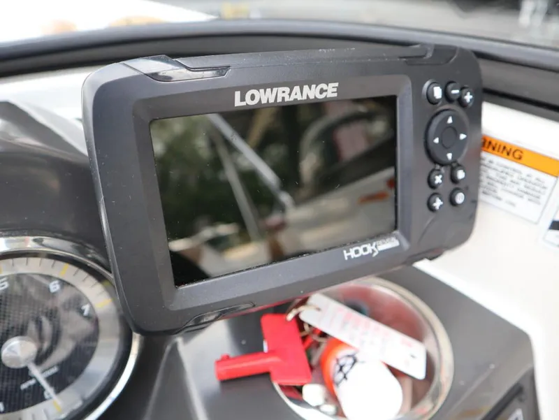 Slide: The Image of Lowrance Hook fishfinder on 2022 Bayliner VR4 Bowrider Outboard dashboard. - 11