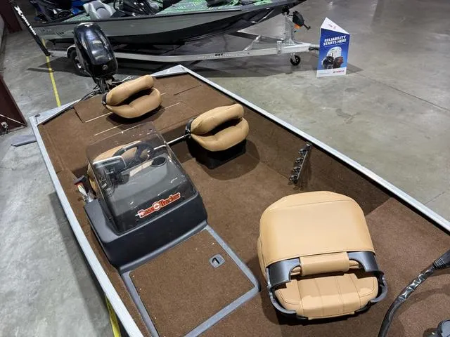 Slide: The Image of 2018 Tracker BASS TRACKER® 40th Anniversary Heritage Edition boat with tan seats and console. - 10