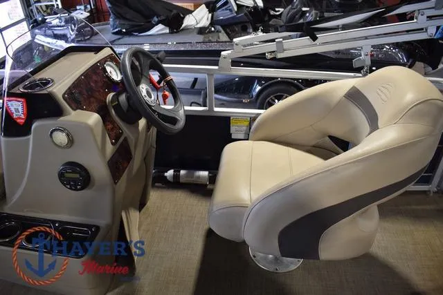 Slide: The Image of Interior of 2020 Sun Tracker Bass Buggy® 16 XL with steering console and captain's chair. - 11