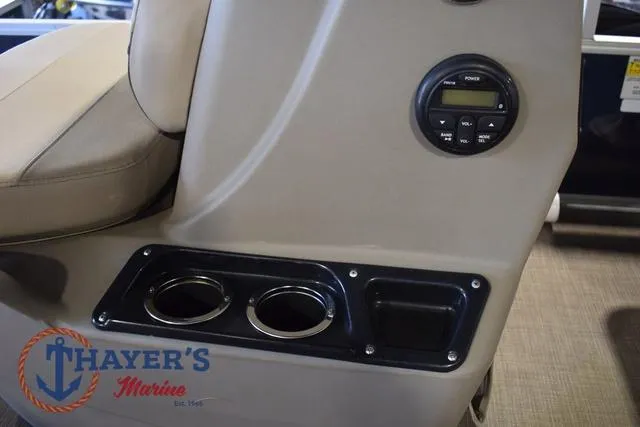 Slide: The Image of 2020 Sun Tracker Bass Buggy® 16 XL console with cup holders and control panel. - 19