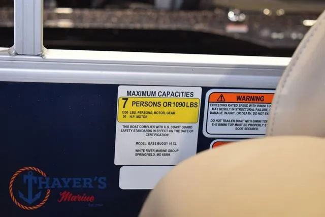 Slide: The Image of 2020 Sun Tracker Bass Buggy® 16 XL capacity label, showing 7-person or 1090 lbs limit. - 20