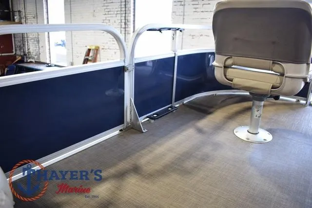 Slide: The Image of 2020 Sun Tracker Bass Buggy® 16 XL interior with seating and railing, showcased at Thayer's Marine. - 22
