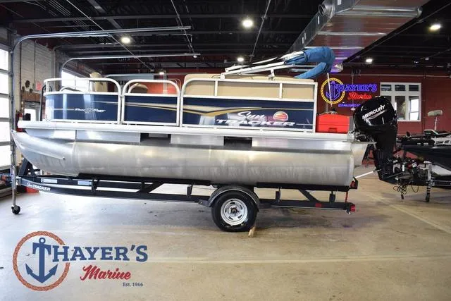 Slide: The Image of 2020 Sun Tracker Bass Buggy® 16 XL pontoon boat on trailer at Thayer's Marine showroom. - 6
