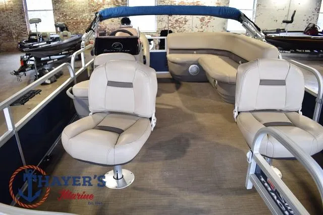 Slide: The Image of 2020 Sun Tracker Bass Buggy® 16 XL pontoon boat interior with seating and steering console. - 9