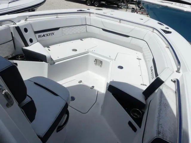 Slide: The Image of 2021 Blackfin 252CC boat interior with spacious seating and modern design. - 14