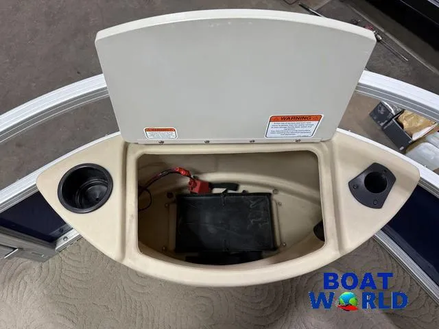 Slide: The Image of Open storage compartment on 2014 Sun Tracker Fishin Barge Pontoon boat. - 11