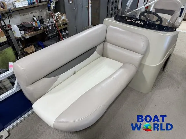 Slide: The Image of 2014 Sun Tracker 24' Fishin Barge Pontoon interior seating at Boat World showroom. - 13
