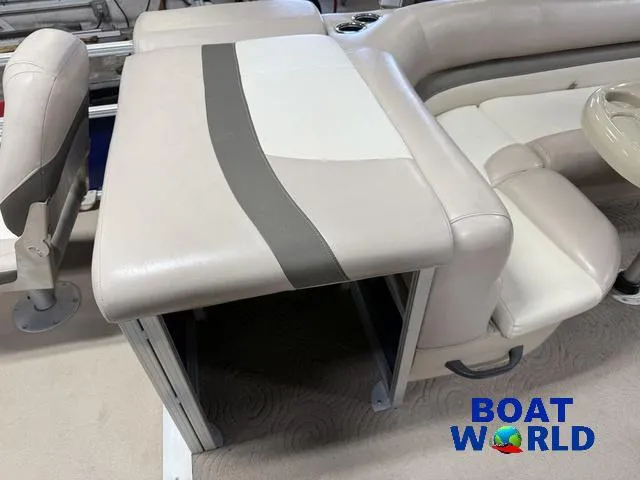 Slide: The Image of 2014 Sun Tracker 24' Fishin Barge Pontoon interior seating with beige upholstery. - 20