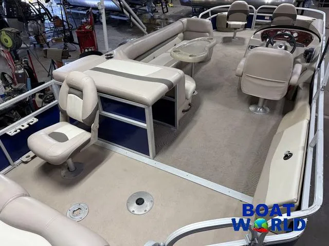 Slide: The Image of 2014 Sun Tracker 24' Fishin Barge Pontoon with Mercury 150HP, spacious seating, and steering console. - 30