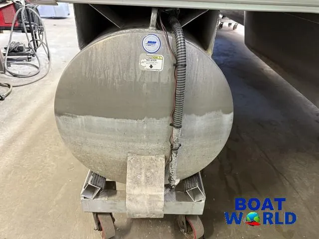 Slide: The Image of 2014 Sun Tracker 24' Fishin Barge Pontoon underside on dolly, Boat World logo visible. - 41