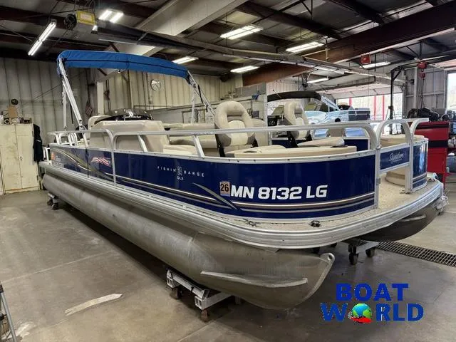 Slide: The Image of 2014 Sun Tracker 24' Fishin Barge Pontoon with Mercury 150HP in a showroom. - 47