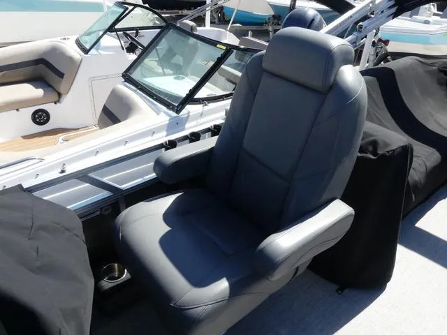 Slide: The Image of 2022 Avalon Catalina Platinum Quad Lounger boat seat, featuring luxurious gray upholstery. - 11