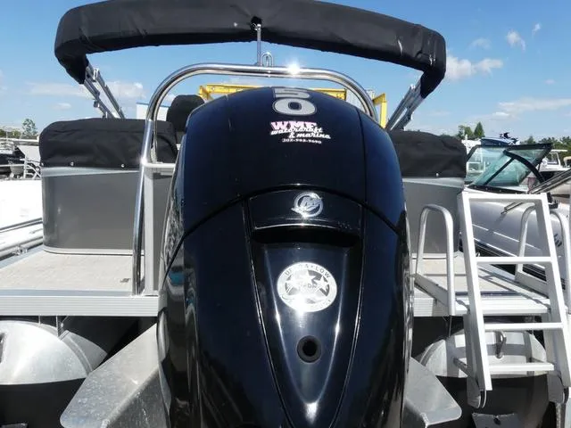 Slide: The Image of 2022 Avalon Catalina Platinum Quad Lounger 23 FT with powerful outboard motor. - 4