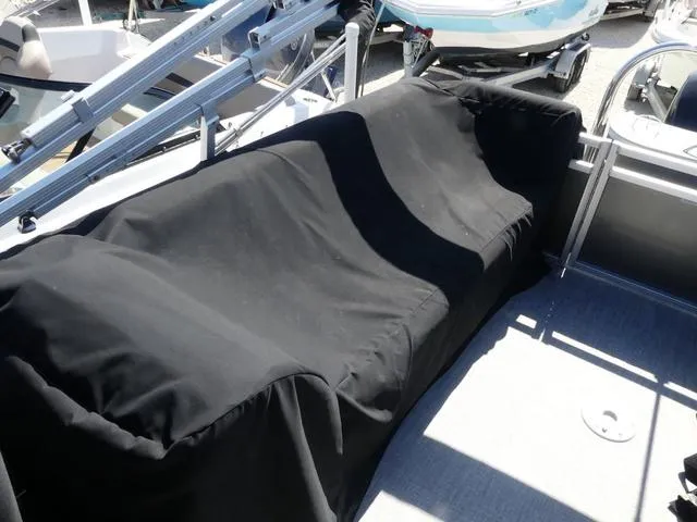 Slide: The Image of 2022 Avalon Catalina Platinum Quad Lounger 23 FT with covered seating area. - 7