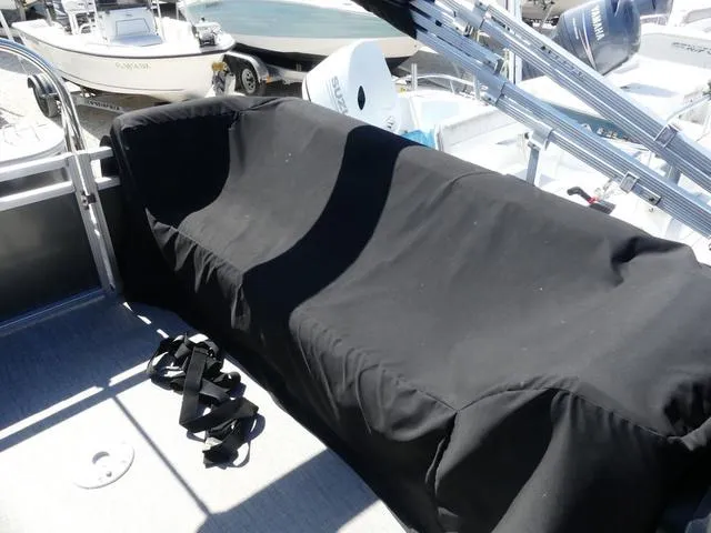 Slide: The Image of 2022 Avalon Catalina Platinum Quad Lounger 23 FT with covered seating area. - 8