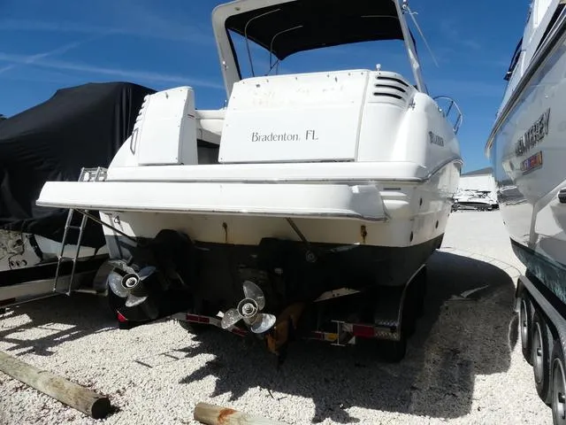 Slide: The Image of 2005 Larson 330 Cabrio boat docked in Bradenton, FL, rear view. - 6