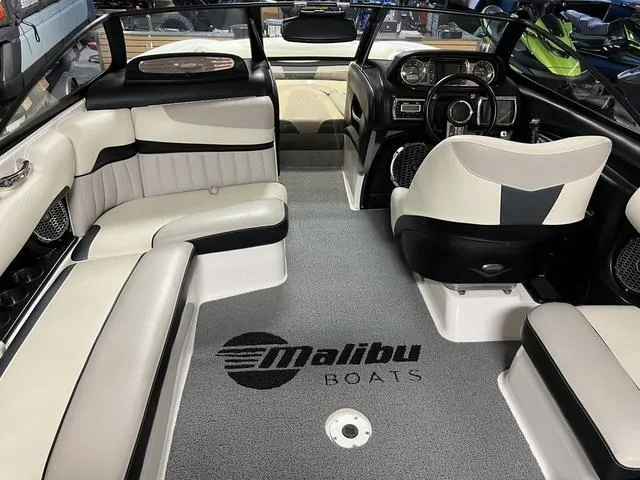 Slide: The Image of Interior of a 2014 Malibu Wakesetter 22 MXZ boat with stylish seating. - 7