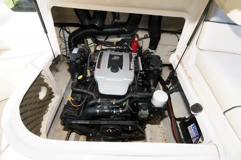 Slide: The Image of Engine compartment of a 2009 Sea Ray 240 Sundeck boat. - 12