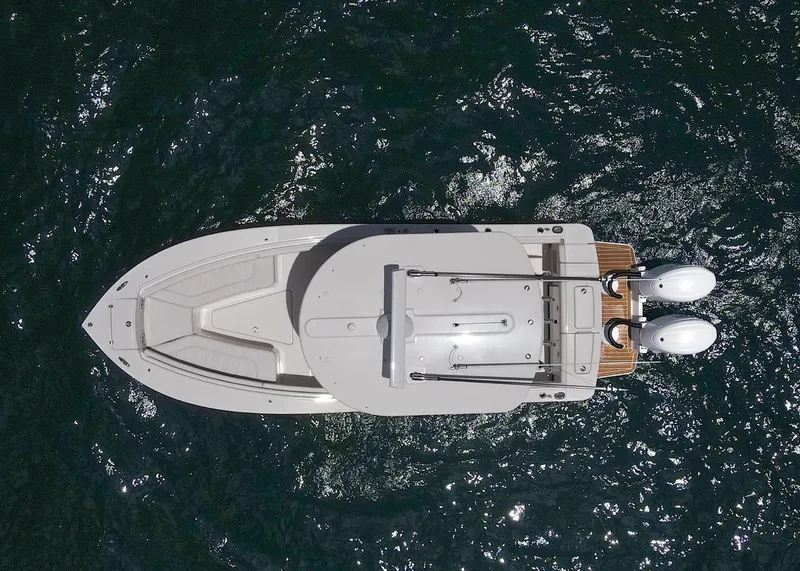 Slide: The Image of Overhead view of 2024 Regulator 23 boat on water. - 30