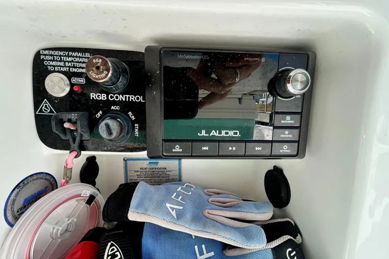 Slide: The Image of Control panel of 2021 Caymas 28 HB boat with JL Audio system and accessories. - 28