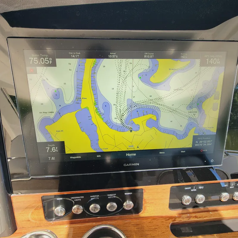 Slide: The Image of Garmin navigation display on 2021 Tiara Yachts 38 LS, showing nautical chart details. - 40