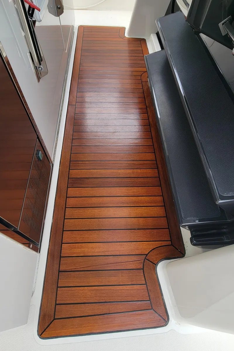 Slide: The Image of 2021 Tiara Yachts 38 LS, elegant wooden deck flooring detail. - 6